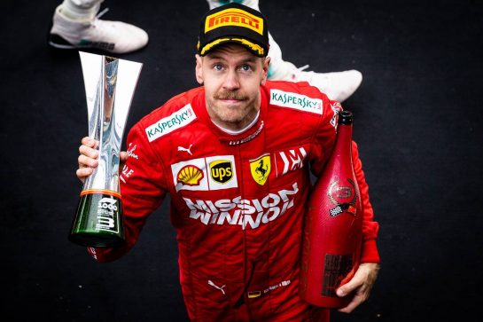 Sebastian Vettel (GER) Ferrari celebrates his third position on the podium.
14.04.2019. Formula 1 World Championship, Rd 3, Chinese Grand Prix, Shanghai, China, Race Day.
- www.xpbimages.com, EMail: requests@xpbimages.com - copy of publication required for printed pictures. Every used picture is fee-liable. © Copyright: Bearne / XPB Images