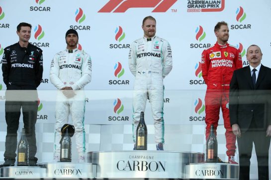 1st place Valtteri Bottas (FIN) Mercedes AMG F1 with 2nd place Lewis Hamilton (GBR) Mercedes AMG F1 W10 and 3rd place Sebastian Vettel (GER) Ferrari.28.04.2019. Formula 1 World Championship, Rd 4, Azerbaijan Grand Prix, Baku Street Circuit, Azerbaijan, Race Day.- www.xpbimages.com, EMail: requests@xpbimages.com - copy of publication required for printed pictures. Every used picture is fee-liable. © Copyright: Batchelor / XPB Images