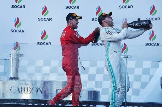 Race winner Valtteri Bottas (FIN) Mercedes AMG F1 celebrates on the podium with third placed Sebastian Vettel (GER) Ferrari.
28.04.2019. Formula 1 World Championship, Rd 4, Azerbaijan Grand Prix, Baku Street Circuit, Azerbaijan, Race Day.
- www.xpbimages.com, EMail: requests@xpbimages.com - copy of publication required for printed pictures. Every used picture is fee-liable. © Copyright: Moy / XPB Images