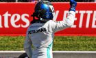 Valtteri Bottas (FIN) Mercedes AMG F1 celebrates his pole position in qualifying parc ferme.