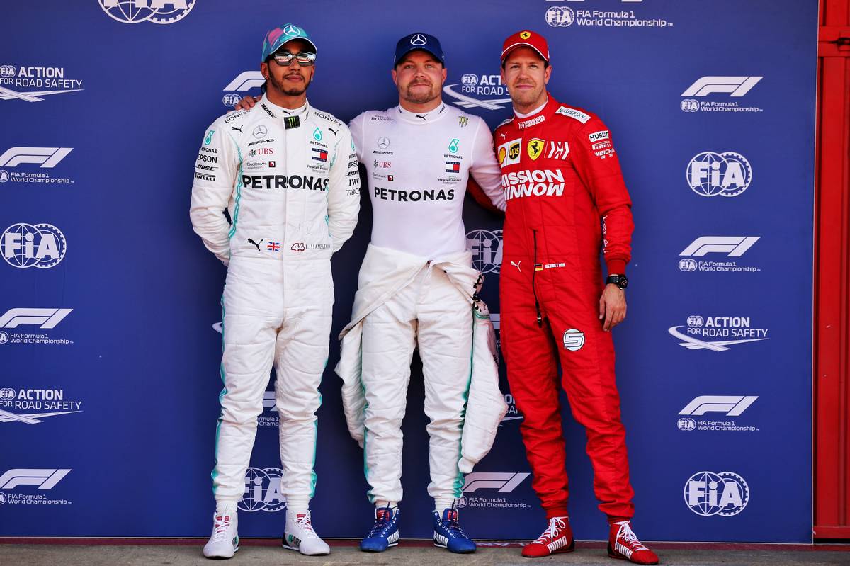 Qualifying top three in parc ferme (L to R): Lewis Hamilton (GBR) Mercedes AMG F1, second; Valtteri Bottas (FIN) Mercedes AMG F1, pole position; Sebastian Vettel (GER) Ferrari, third.
