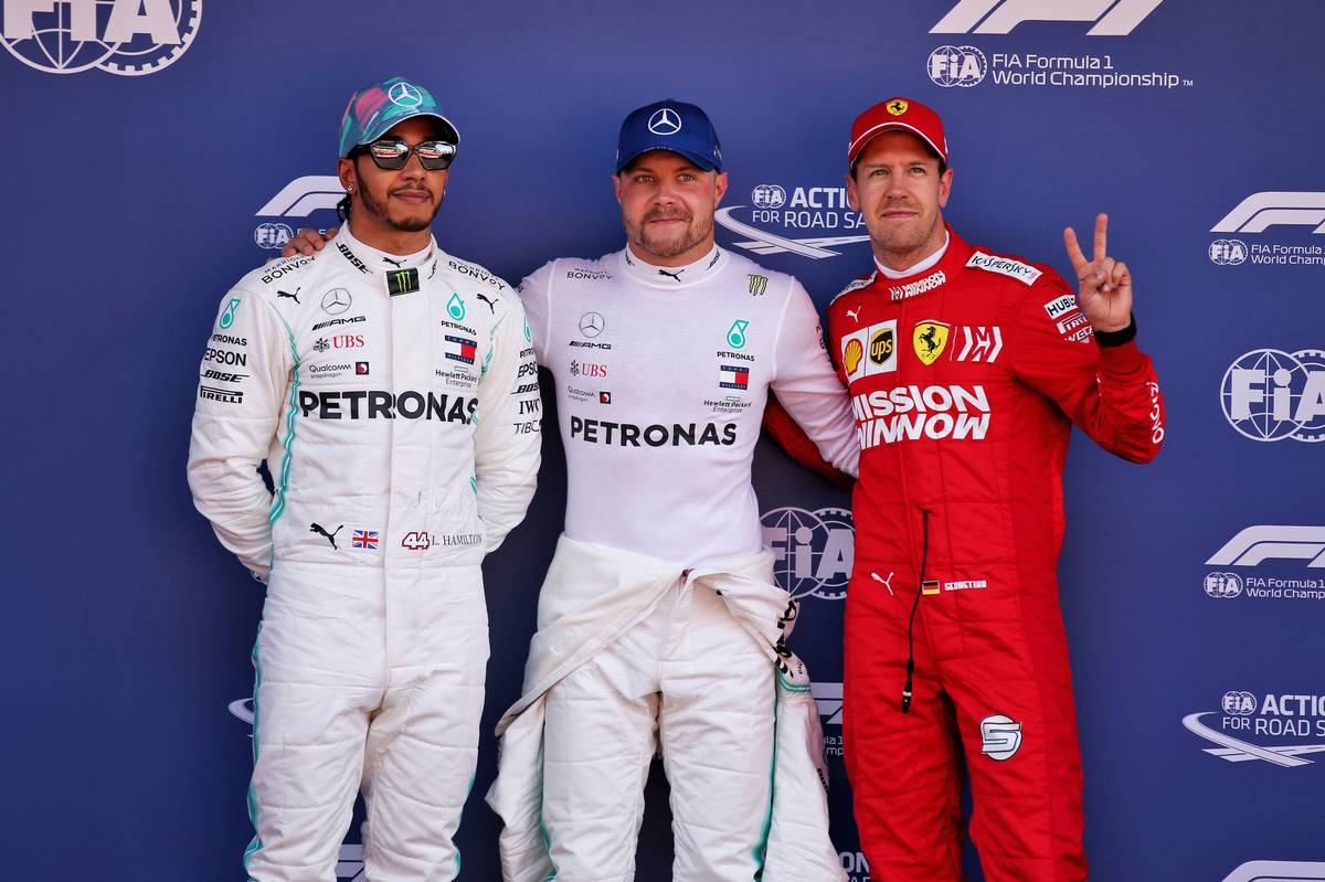 Qualifying top three in parc ferme (L to R): Lewis Hamilton (GBR) Mercedes AMG F1, second; Valtteri Bottas (FIN) Mercedes AMG F1, pole position; Sebastian Vettel (GER) Ferrari, third. 11.05.2019