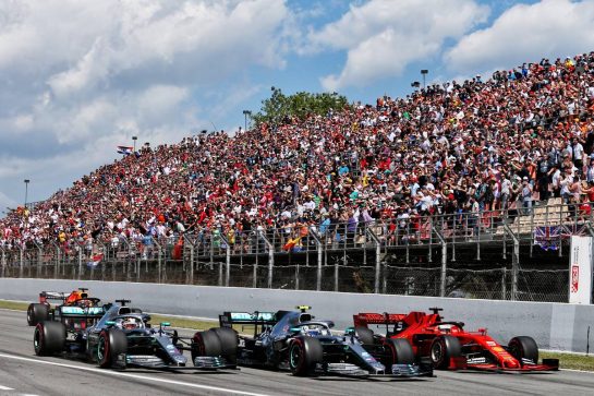 (L to R): Lewis Hamilton (GBR) Mercedes AMG F1 W10, Valtteri Bottas (FIN) Mercedes AMG F1 W10, and Sebastian Vettel (GER) Ferrari SF90 at the start of the race.
12.05.2019. Formula 1 World Championship, Rd 5, Spanish Grand Prix, Barcelona, Spain, Race Day.
- www.xpbimages.com, EMail: requests@xpbimages.com - copy of publication required for printed pictures. Every used picture is fee-liable. © Copyright: Moy / XPB Images