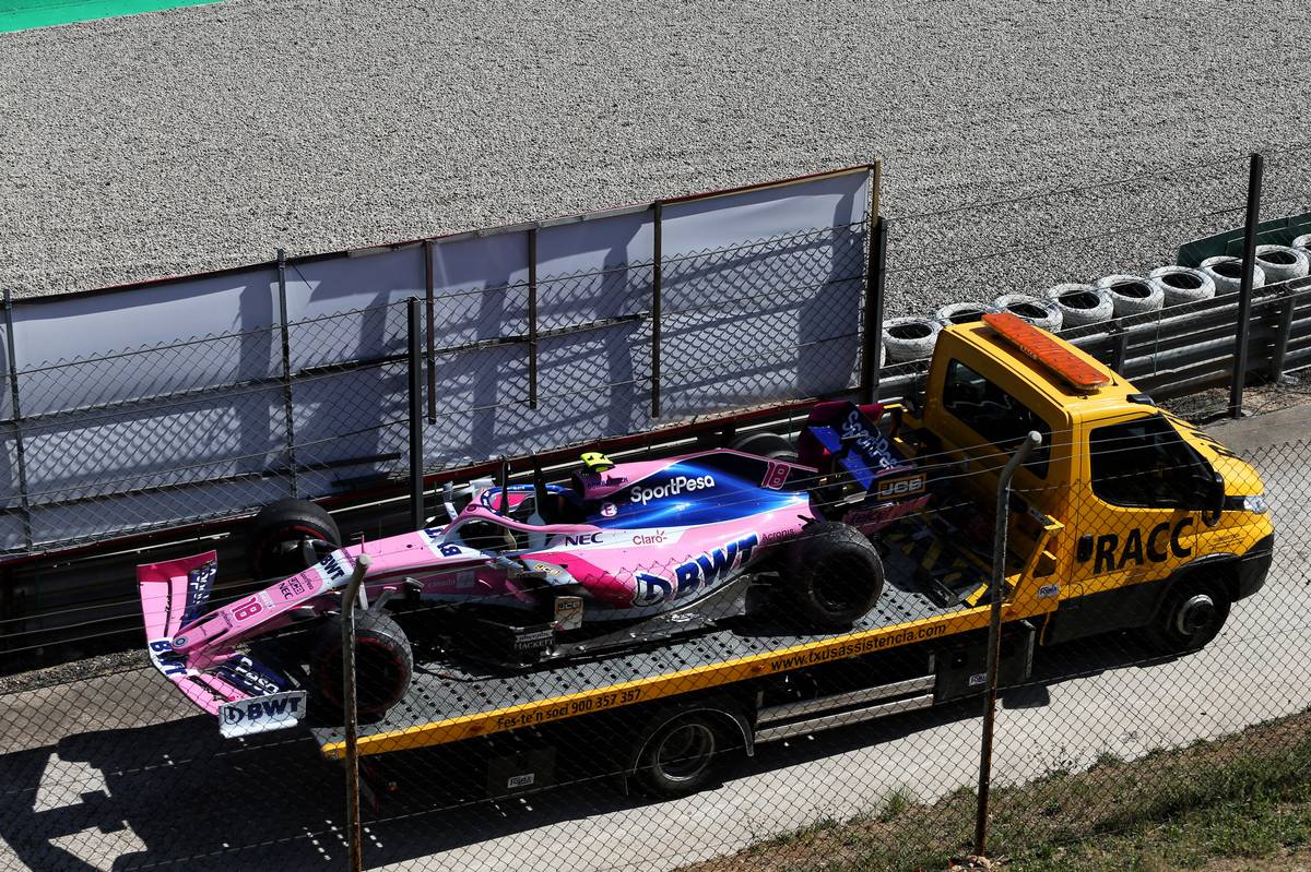 The Racing Point F1 Team RP19 of race retiree Lance Stroll (CDN) Racing Point F1 Team is recovered back to the pits on the back of a truck.