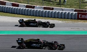 Magnussen insists contact with Grosjean 'not intentional'