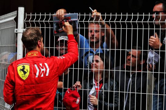 Sebastian Vettel (GER) Ferrari signs autographs for the fans.
23.05.2019. Formula 1 World Championship, Rd 6, Monaco Grand Prix, Monte Carlo, Monaco, Practice Day.
- www.xpbimages.com, EMail: requests@xpbimages.com - copy of publication required for printed pictures. Every used picture is fee-liable. © Copyright: Moy / XPB Images