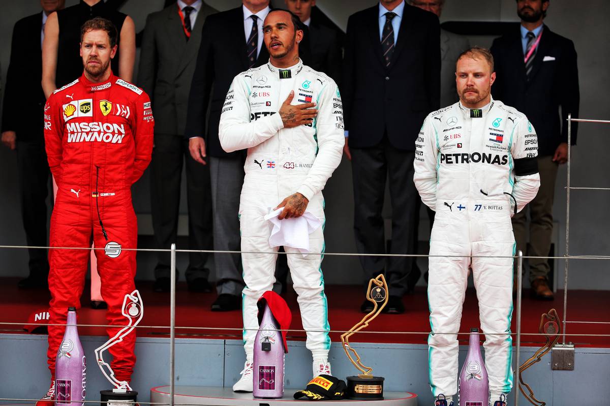 The podium (L to R): Sebastian Vettel (GER) Ferrari second; Lewis Hamilton (GBR) Mercedes AMG F1, race winner; Valtteri Bottas (FIN) Mercedes AMG F1, third.