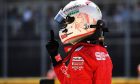 Sebastian Vettel (GER) Ferrari celebrates his pole position in qualifying parc ferme.