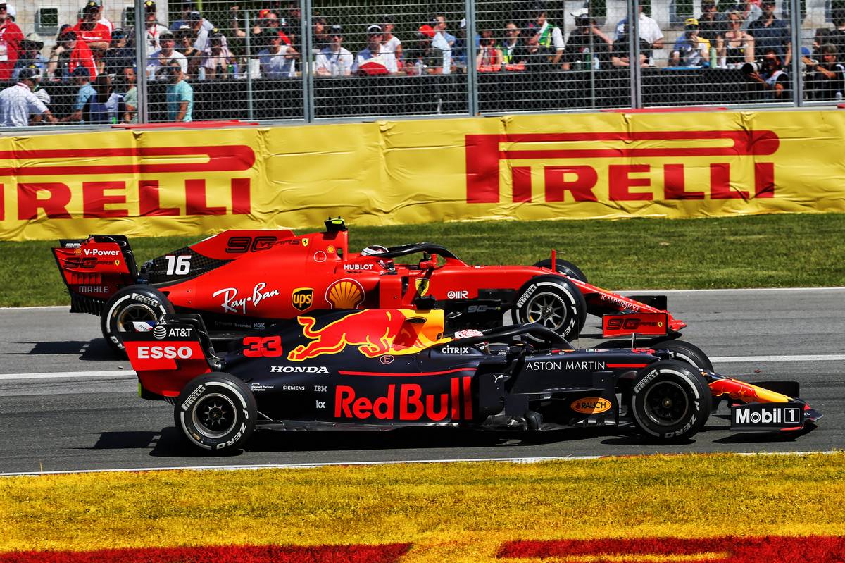 Max Verstappen (NLD) Red Bull Racing RB15 and Charles Leclerc (MON) Ferrari SF90.