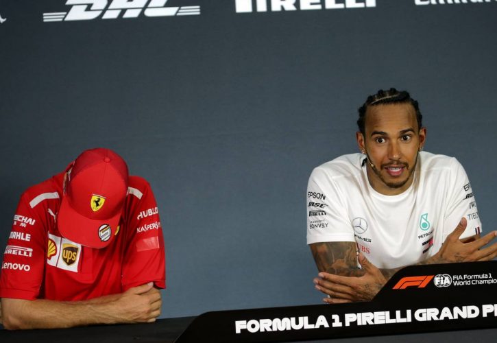 Sebastian Vettel (GER) Ferrari and Lewis Hamilton (GBR) Mercedes AMG F1 in the post race FIA Press Conference.