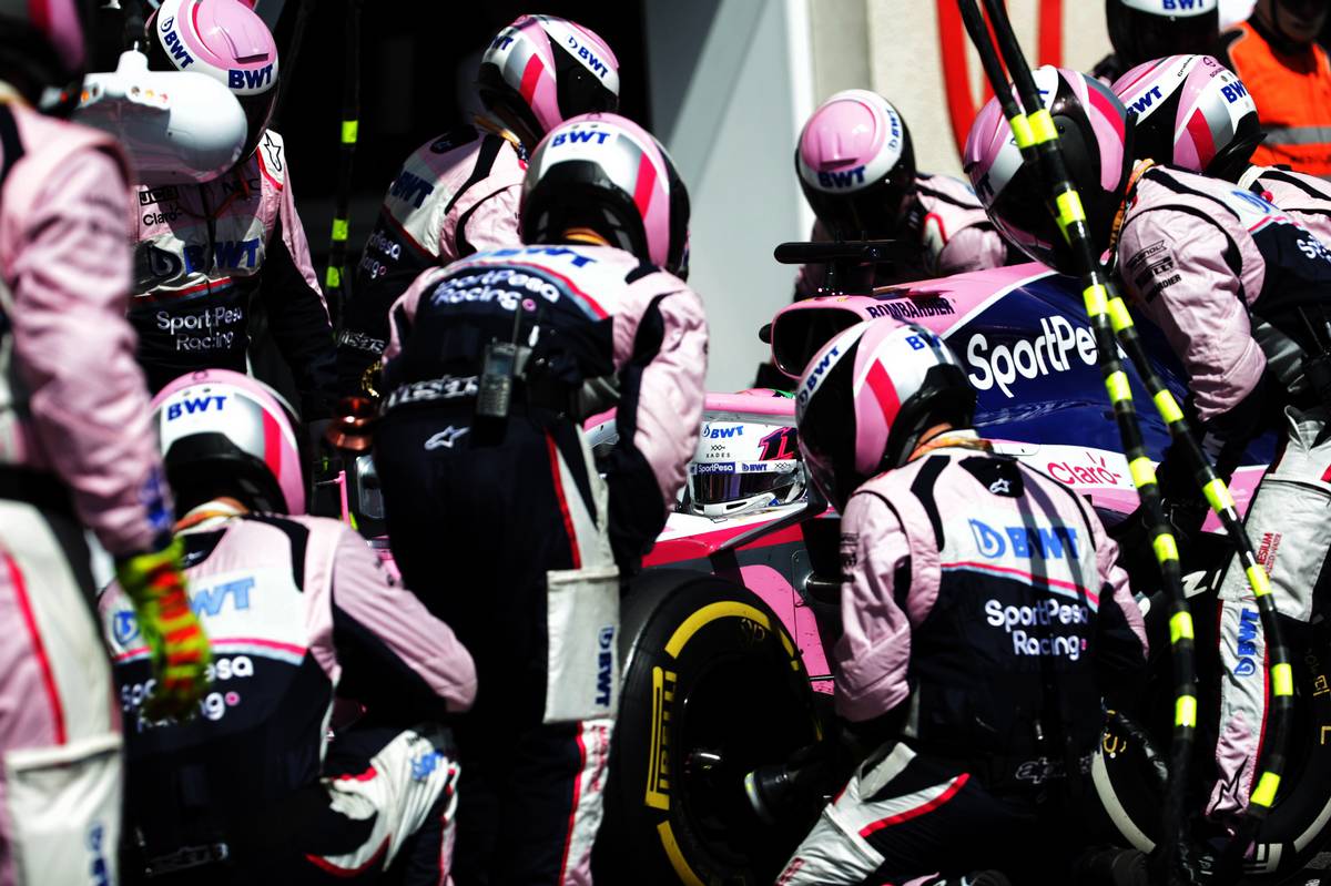 Sergio Perez (MEX) Racing Point F1 Team RP19 makes a pit stop.