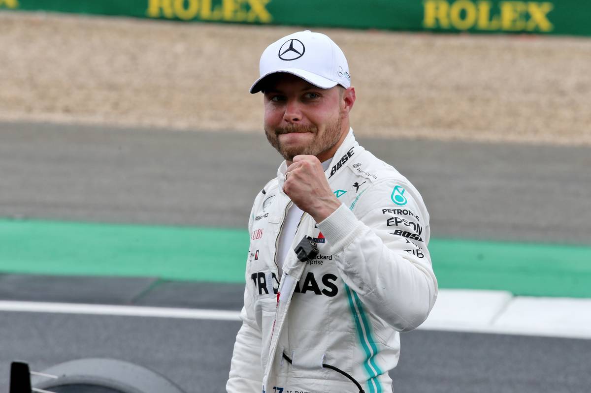 Valtteri Bottas (FIN) Mercedes AMG F1 celebrates his pole position in qualifying parc ferme