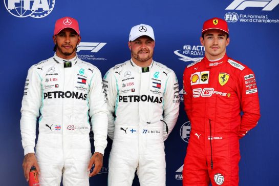 Qualifying top three in parc ferme (L to R): Lewis Hamilton (GBR) Mercedes AMG F1, second; Valtteri Bottas (FIN) Mercedes AMG F1, pole position; Charles Leclerc (MON) Ferrari, third.
13.07.2019. Formula 1 World Championship, Rd 10, British Grand Prix, Silverstone, England, Qualifying Day.
- www.xpbimages.com, EMail: requests@xpbimages.com - copy of publication required for printed pictures. Every used picture is fee-liable. © Copyright: Batchelor / XPB Images