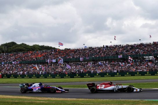 Antonio Giovinazzi (ITA) Alfa Romeo Racing C38 leads Daniil Kvyat (RUS) Scuderia Toro Rosso STR14.
14.07.2019. Formula 1 World Championship, Rd 10, British Grand Prix, Silverstone, England, Race Day.
- www.xpbimages.com, EMail: requests@xpbimages.com - copy of publication required for printed pictures. Every used picture is fee-liable. © Copyright: Bearne / XPB Images