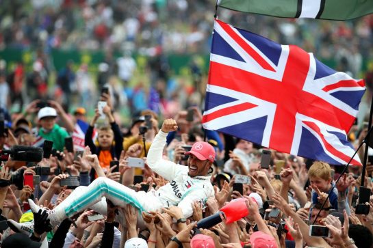 1st place Lewis Hamilton (GBR) Mercedes AMG F1 W10 crowd surfing.14.07.2019. Formula 1 World Championship, Rd 10, British Grand Prix, Silverstone, England, Race Day.- www.xpbimages.com, EMail: requests@xpbimages.com - copy of publication required for printed pictures. Every used picture is fee-liable. © Copyright: Batchelor / XPB Images
