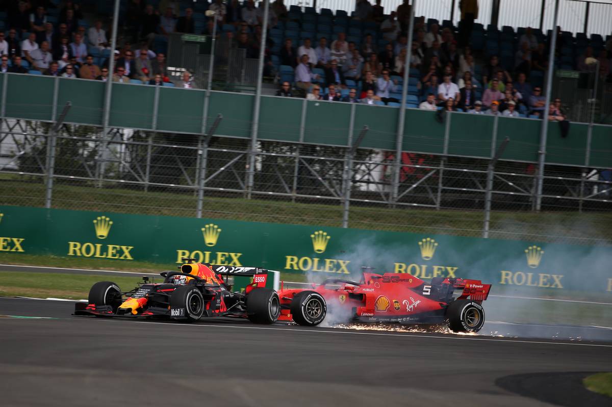 Sebastian Vettel (GER) Ferrari SF90 crashes into the back of Max Verstappen (NLD) Red Bull Racing RB15.