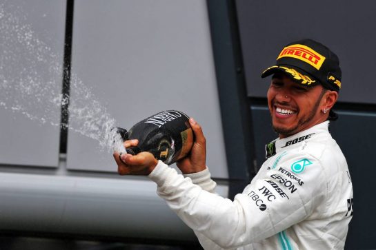 Race winner Lewis Hamilton (GBR) Mercedes AMG F1 celebrates on the podium.
14.07.2019. Formula 1 World Championship, Rd 10, British Grand Prix, Silverstone, England, Race Day.
- www.xpbimages.com, EMail: requests@xpbimages.com - copy of publication required for printed pictures. Every used picture is fee-liable. © Copyright: Moy / XPB Images