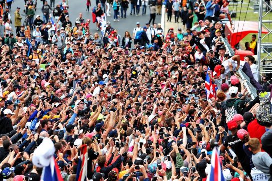 Race winner Lewis Hamilton (GBR) Mercedes AMG F1 celebrates with the fans at the end of the race.
14.07.2019. Formula 1 World Championship, Rd 10, British Grand Prix, Silverstone, England, Race Day.
- www.xpbimages.com, EMail: requests@xpbimages.com - copy of publication required for printed pictures. Every used picture is fee-liable. © Copyright: Moy / XPB Images