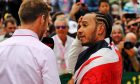 Race winner Lewis Hamilton (GBR) Mercedes AMG F1 with Jenson Button (GBR) Sky Sports F1 Presenter in parc ferme.