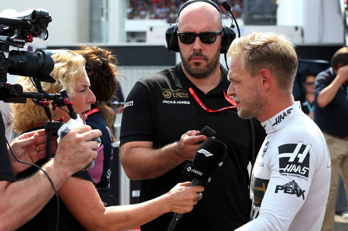 Kevin Magnussen (DEN) Haas F1 Team with the media.