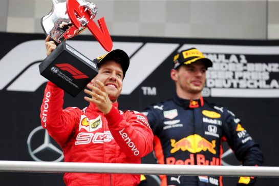 Sebastian Vettel (GER) Ferrari celebrates his second position on the podium.
28.07.2019. Formula 1 World Championship, Rd 11, German Grand Prix, Hockenheim, Germany, Race Day.
 - www.xpbimages.com, EMail: requests@xpbimages.com - copy of publication required for printed pictures. Every used picture is fee-liable. © Copyright: Bearne / XPB Images