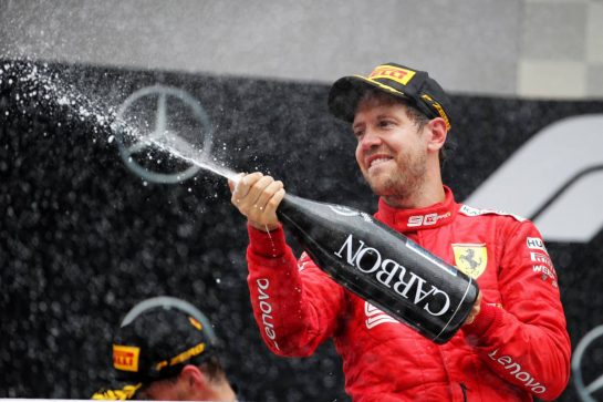 Sebastian Vettel (GER) Ferrari celebrates his second position on the podium.
28.07.2019. Formula 1 World Championship, Rd 11, German Grand Prix, Hockenheim, Germany, Race Day.
 - www.xpbimages.com, EMail: requests@xpbimages.com - copy of publication required for printed pictures. Every used picture is fee-liable. © Copyright: Bearne / XPB Images