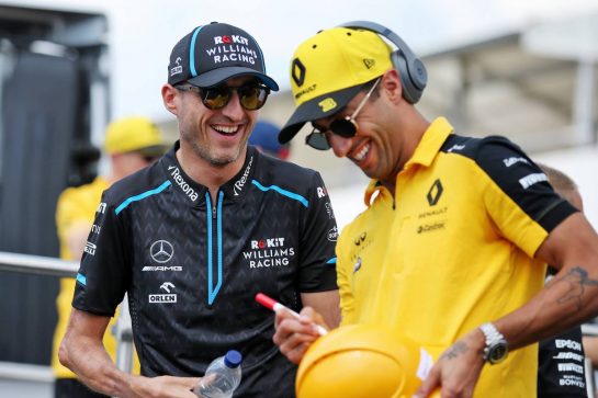 (L to R): Robert Kubica (POL) Williams Racing with Daniel Ricciardo (AUS) Renault F1 Team on the drivers parade.
04.08.2019. Formula 1 World Championship, Rd 12, Hungarian Grand Prix, Budapest, Hungary, Race Day.
- www.xpbimages.com, EMail: requests@xpbimages.com - copy of publication required for printed pictures. Every used picture is fee-liable. © Copyright: Batchelor / XPB Images