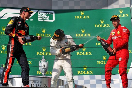 The podium (L to R): Max Verstappen (NLD) Red Bull Racing, second; Lewis Hamilton (GBR) Mercedes AMG F1, race winner; Sebastian Vettel (GER) Ferrari, third.
04.08.2019. Formula 1 World Championship, Rd 12, Hungarian Grand Prix, Budapest, Hungary, Race Day.
- www.xpbimages.com, EMail: requests@xpbimages.com - copy of publication required for printed pictures. Every used picture is fee-liable. © Copyright: Moy / XPB Images