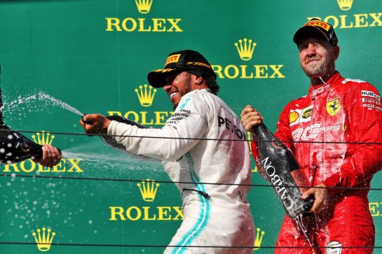 Race winner Lewis Hamilton (GBR) Mercedes AMG F1 celebrates on the podium with Sebastian Vettel (GER) Ferrari.
04.08.2019. Formula 1 World Championship, Rd 12, Hungarian Grand Prix, Budapest, Hungary, Race Day.
- www.xpbimages.com, EMail: requests@xpbimages.com - copy of publication required for printed pictures. Every used picture is fee-liable. © Copyright: Moy / XPB Images