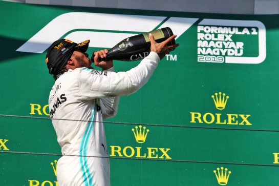 Race winner Lewis Hamilton (GBR) Mercedes AMG F1 celebrates on the podium.
04.08.2019. Formula 1 World Championship, Rd 12, Hungarian Grand Prix, Budapest, Hungary, Race Day.
- www.xpbimages.com, EMail: requests@xpbimages.com - copy of publication required for printed pictures. Every used picture is fee-liable. © Copyright: Moy / XPB Images