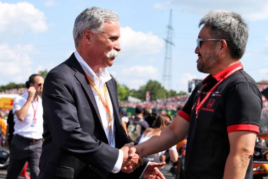 (L to R): Chase Carey (USA) Formula One Group Chairman with Toyoharu Tanabe (JPN) Honda Racing F1 Technical Director on the grid.
04.08.2019. Formula 1 World Championship, Rd 12, Hungarian Grand Prix, Budapest, Hungary, Race Day.
- www.xpbimages.com, EMail: requests@xpbimages.com - copy of publication required for printed pictures. Every used picture is fee-liable. © Copyright: Moy / XPB Images