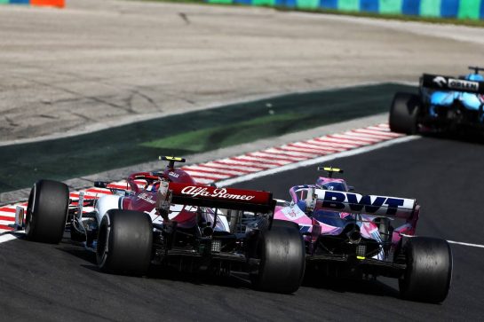 Antonio Giovinazzi (ITA) Alfa Romeo Racing C38 and Lance Stroll (CDN) Racing Point F1 Team RP19 battle for position.
04.08.2019. Formula 1 World Championship, Rd 12, Hungarian Grand Prix, Budapest, Hungary, Race Day.
- www.xpbimages.com, EMail: requests@xpbimages.com - copy of publication required for printed pictures. Every used picture is fee-liable. © Copyright: Moy / XPB Images