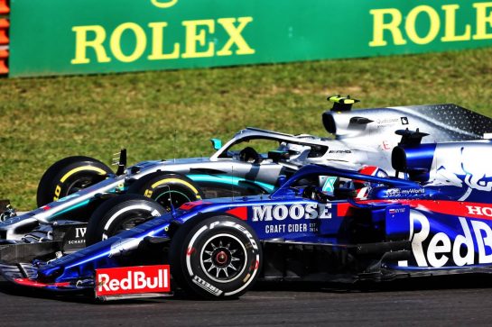 Valtteri Bottas (FIN) Mercedes AMG F1 W10 and Daniil Kvyat (RUS) Scuderia Toro Rosso STR14 battle for position.
04.08.2019. Formula 1 World Championship, Rd 12, Hungarian Grand Prix, Budapest, Hungary, Race Day.
- www.xpbimages.com, EMail: requests@xpbimages.com - copy of publication required for printed pictures. Every used picture is fee-liable. © Copyright: Moy / XPB Images