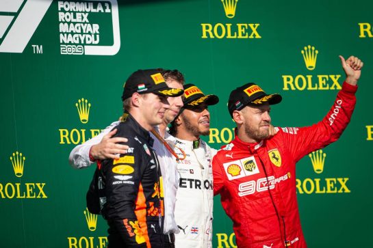 The podium (L to R): Max Verstappen (NLD) Red Bull Racing, second; James Vowles (GBR) Mercedes AMG F1 Chief Strategist; Lewis Hamilton (GBR) Mercedes AMG F1, race winner; Sebastian Vettel (GER) Ferrari, third.
04.08.2019. Formula 1 World Championship, Rd 12, Hungarian Grand Prix, Budapest, Hungary, Race Day.
 - www.xpbimages.com, EMail: requests@xpbimages.com - copy of publication required for printed pictures. Every used picture is fee-liable. © Copyright: Bearne / XPB Images