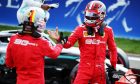 Charles Leclerc (MON) Ferrari celebrates his pole position in qualifying parc ferme with team mate Sebastian Vettel (GER) Ferrari.
