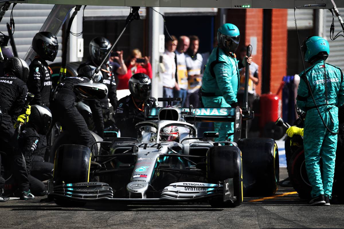 Lewis Hamilton (GBR) Mercedes AMG F1 W10 makes a pit stop.