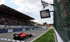 Race winner Charles Leclerc (MON) Ferrari SF90 takes the chequered flag at the end of the race.