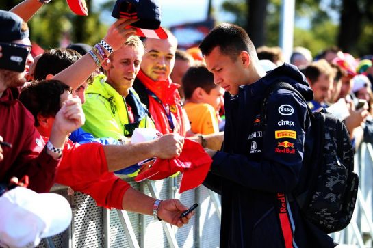 Alexander Albon (THA) Red Bull Racing signs autographs for the fans.
08.09.2019. Formula 1 World Championship, Rd 14, Italian Grand Prix, Monza, Italy, Race Day.
- www.xpbimages.com, EMail: requests@xpbimages.com - copy of publication required for printed pictures. Every used picture is fee-liable. © Copyright: Filipe / XPB Images