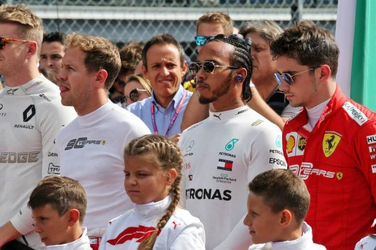 Lewis Hamilton (GBR) Mercedes AMG F1 and Charles Leclerc (MON) Ferrari as the grid observes the national anthem.
08.09.2019. Formula 1 World Championship, Rd 14, Italian Grand Prix, Monza, Italy, Race Day.
- www.xpbimages.com, EMail: requests@xpbimages.com - copy of publication required for printed pictures. Every used picture is fee-liable. © Copyright: Batchelor / XPB Images