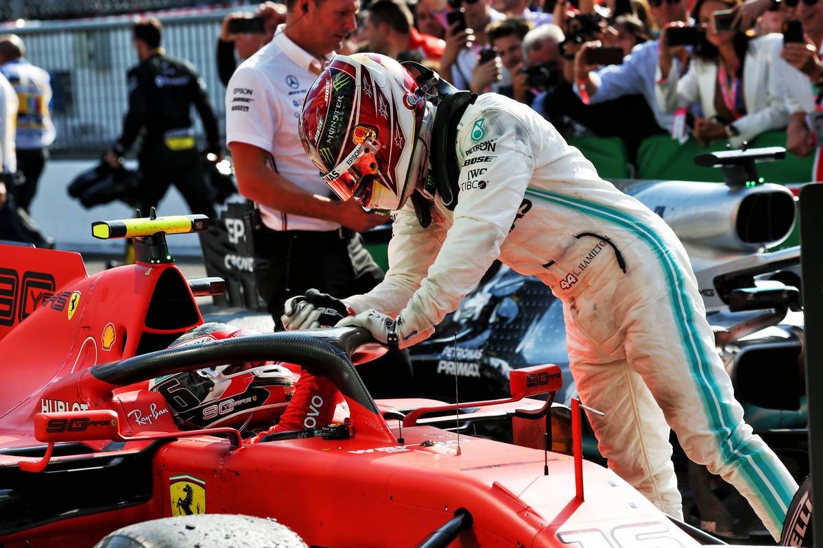 Race winner Charles Leclerc (MON) Ferrari SF90 is congratulated in parc ferme by third placed Lewis Hamilton