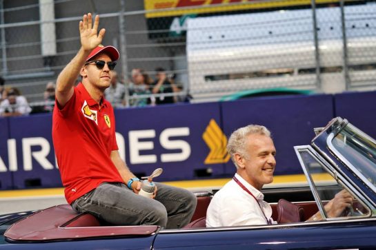 Sebastian Vettel (GER) Ferrari on the drivers parade.
22.09.2019. Formula 1 World Championship, Rd 15, Singapore Grand Prix, Marina Bay Street Circuit, Singapore, Race Day.
- www.xpbimages.com, EMail: requests@xpbimages.com - copy of publication required for printed pictures. Every used picture is fee-liable. © Copyright: Dungan / XPB Images