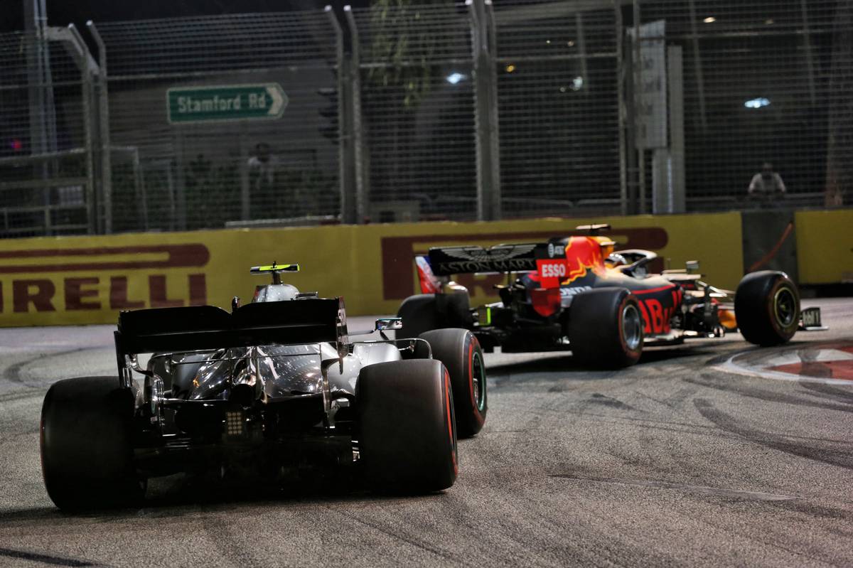 Max Verstappen (NLD) Red Bull Racing RB15 leads Valtteri Bottas (FIN) Mercedes AMG F1 W10.