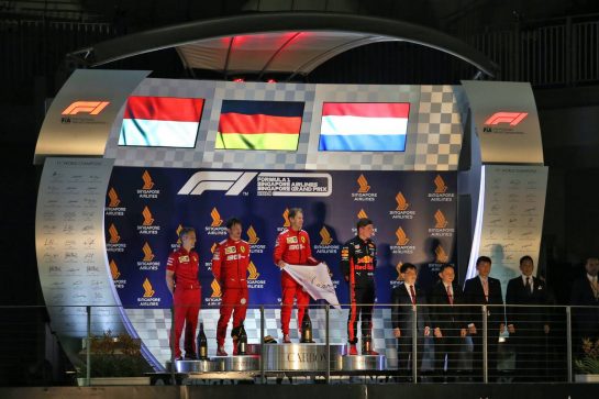 The podium (L to R): Inaki Rueda (ESP) Ferrari Race Strategist; Charles Leclerc (MON) Ferrari, second; Sebastian Vettel (GER) Ferrari, race winner; Max Verstappen (NLD) Red Bull Racing, third.
22.09.2019. Formula 1 World Championship, Rd 15, Singapore Grand Prix, Marina Bay Street Circuit, Singapore, Race Day.
- www.xpbimages.com, EMail: requests@xpbimages.com - copy of publication required for printed pictures. Every used picture is fee-liable. © Copyright: Moy / XPB Images