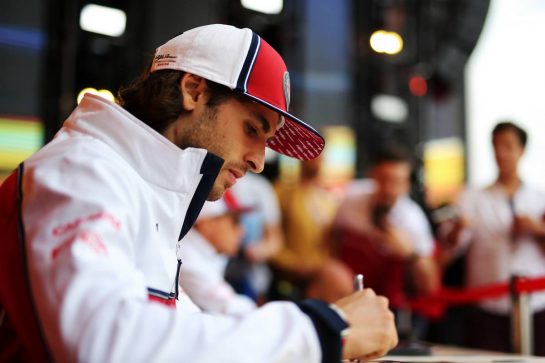 Antonio Giovinazzi (ITA) Alfa Romeo Racing signs autographs for the fans.
26.09.2019. Formula 1 World Championship, Rd 16, Russian Grand Prix, Sochi Autodrom, Sochi, Russia, Preparation Day.
 - www.xpbimages.com, EMail: requests@xpbimages.com - copy of publication required for printed pictures. Every used picture is fee-liable. © Copyright: Filipe / XPB Images