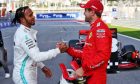 Lewis Hamilton (GBR) Mercedes AMG F1 with Sebastian Vettel (GER) Ferrari in qualifying parc ferme.