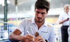 Carlos Sainz Jr (ESP) McLaren signs autographs for the fans.