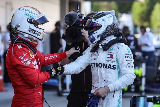 Sebastian Vettel (GER), Scuderia Ferrari and Valtteri Bottas (FIN), Mercedes AMG F1
13.10.2019. Formula 1 World Championship, Rd 17, Japanese Grand Prix, Suzuka, Japan, Race Day.
- www.xpbimages.com, EMail: requests@xpbimages.com - copy of publication required for printed pictures. Every used picture is fee-liable. © Copyright: Charniaux / XPB Images