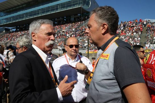 Chase Carey (USA) Formula One Group Chairman with Mario Isola (ITA) Pirelli Racing Manager on the grid13.10.2019. Formula 1 World Championship, Rd 17, Japanese Grand Prix, Suzuka, Japan, Race Day.- www.xpbimages.com, EMail: requests@xpbimages.com - copy of publication required for printed pictures. Every used picture is fee-liable. © Copyright: Batchelor / XPB Images