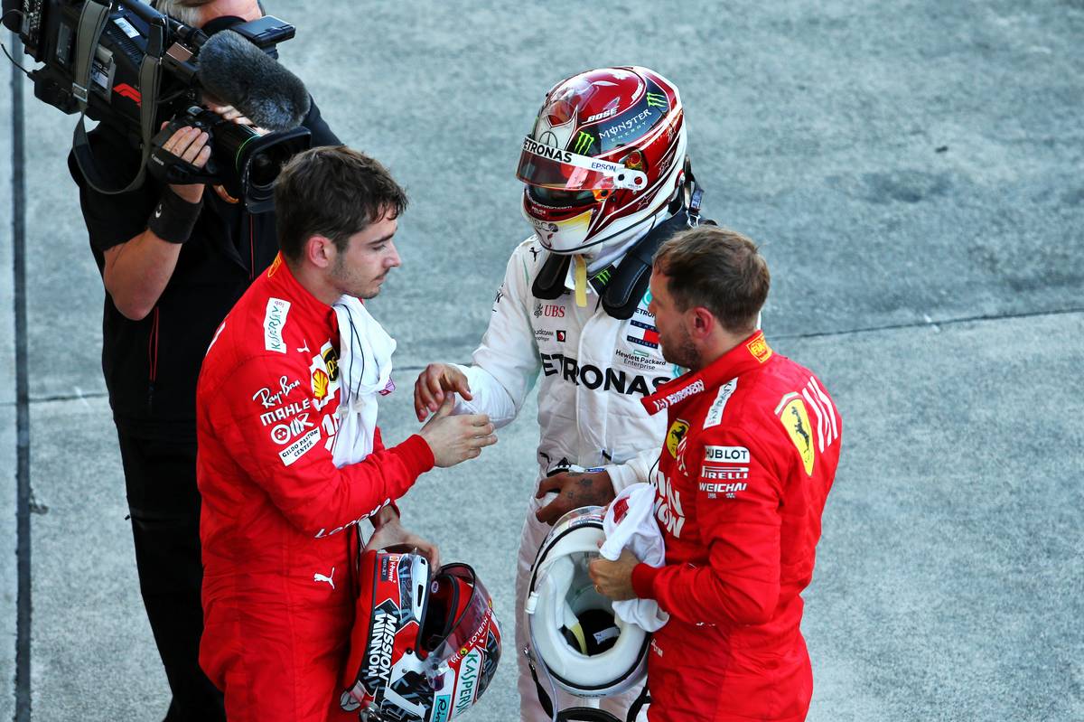 Charles Leclerc (MON) Ferrari; Lewis Hamilton (GBR) Mercedes AMG F1; and Sebastian Vettel (GER) Ferrari, in parc ferme.