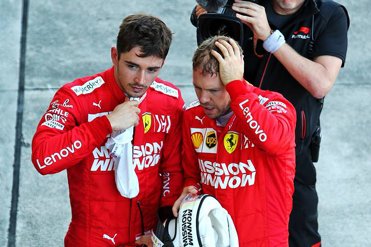 Charles Leclerc (MON) Ferrari with team mate Sebastian Vettel (GER) Ferrari in parc ferme